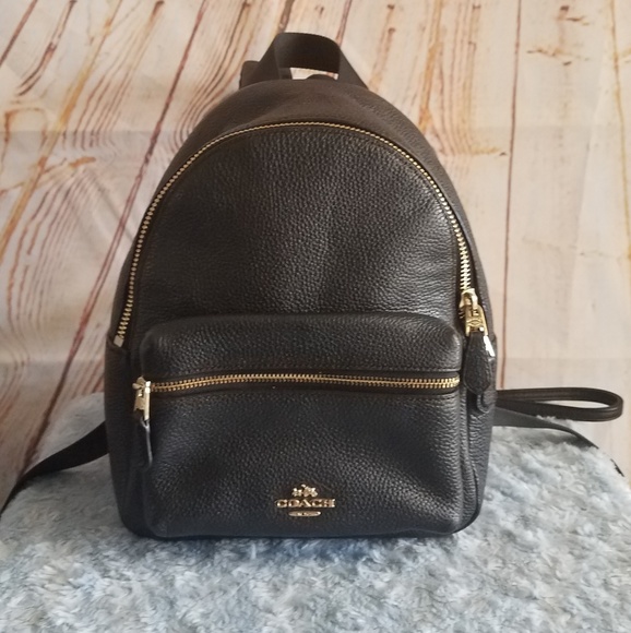 Coach Handbags - Coach Mini Charlie Pebble Leather Backpack